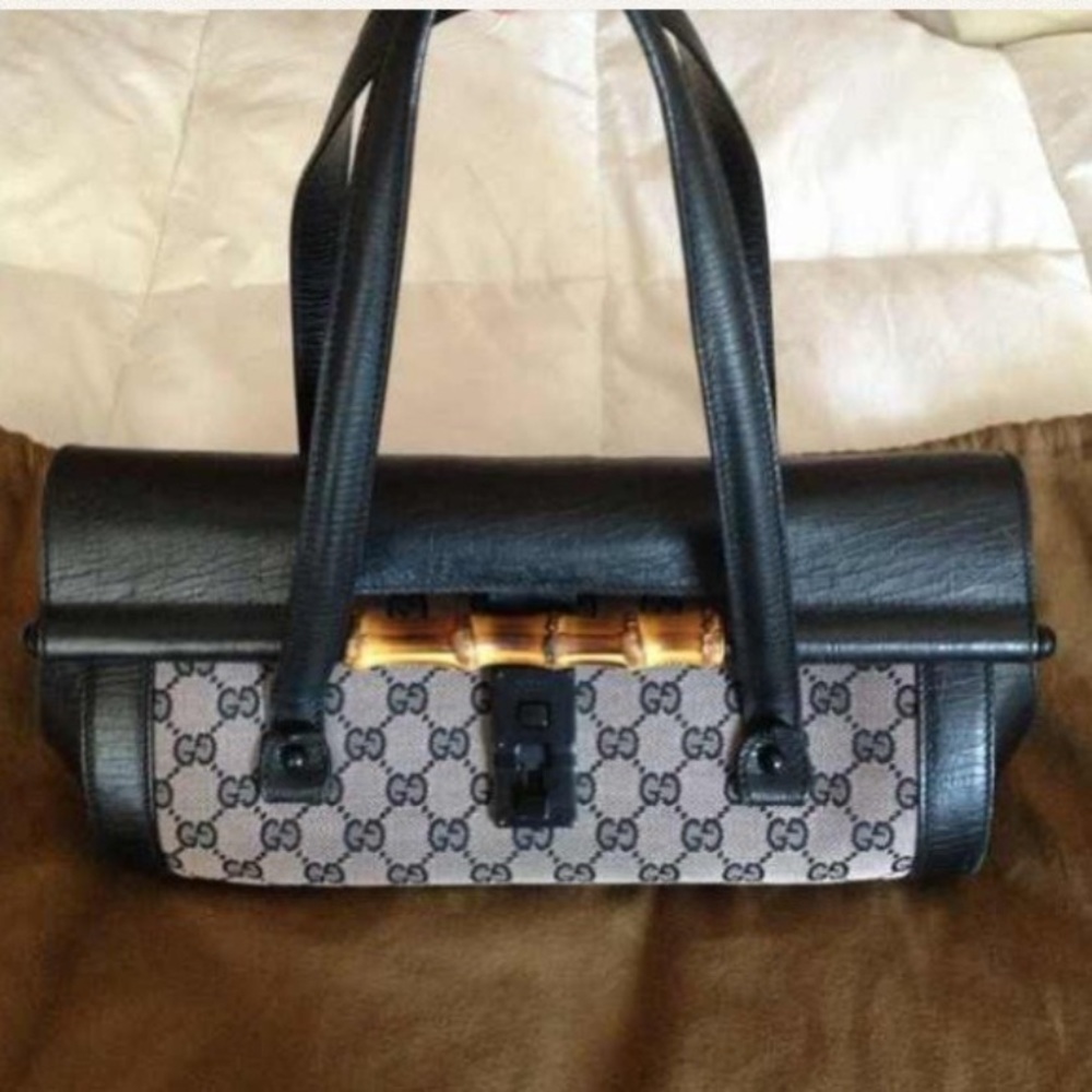 Authentic Gucci handbag With Iconic Bamboo Detail